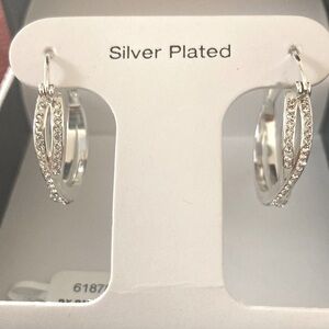 And Now This Crystal Crossover Hoop Earrings. 0.95" diameter. Silver plated. NWT